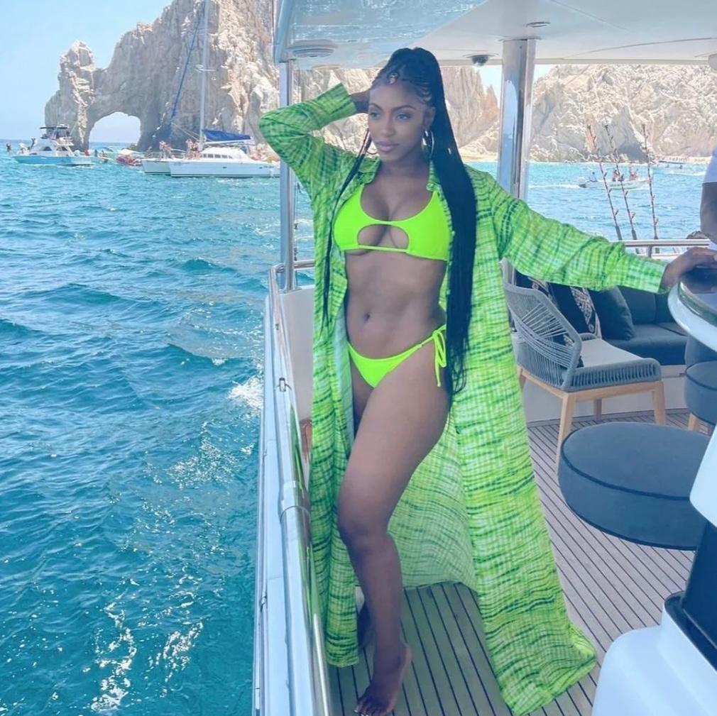 Real Housewives of Atlanta Porsha Williams Guobadia wearing Sai Sankoh Green allegra print shirt dress