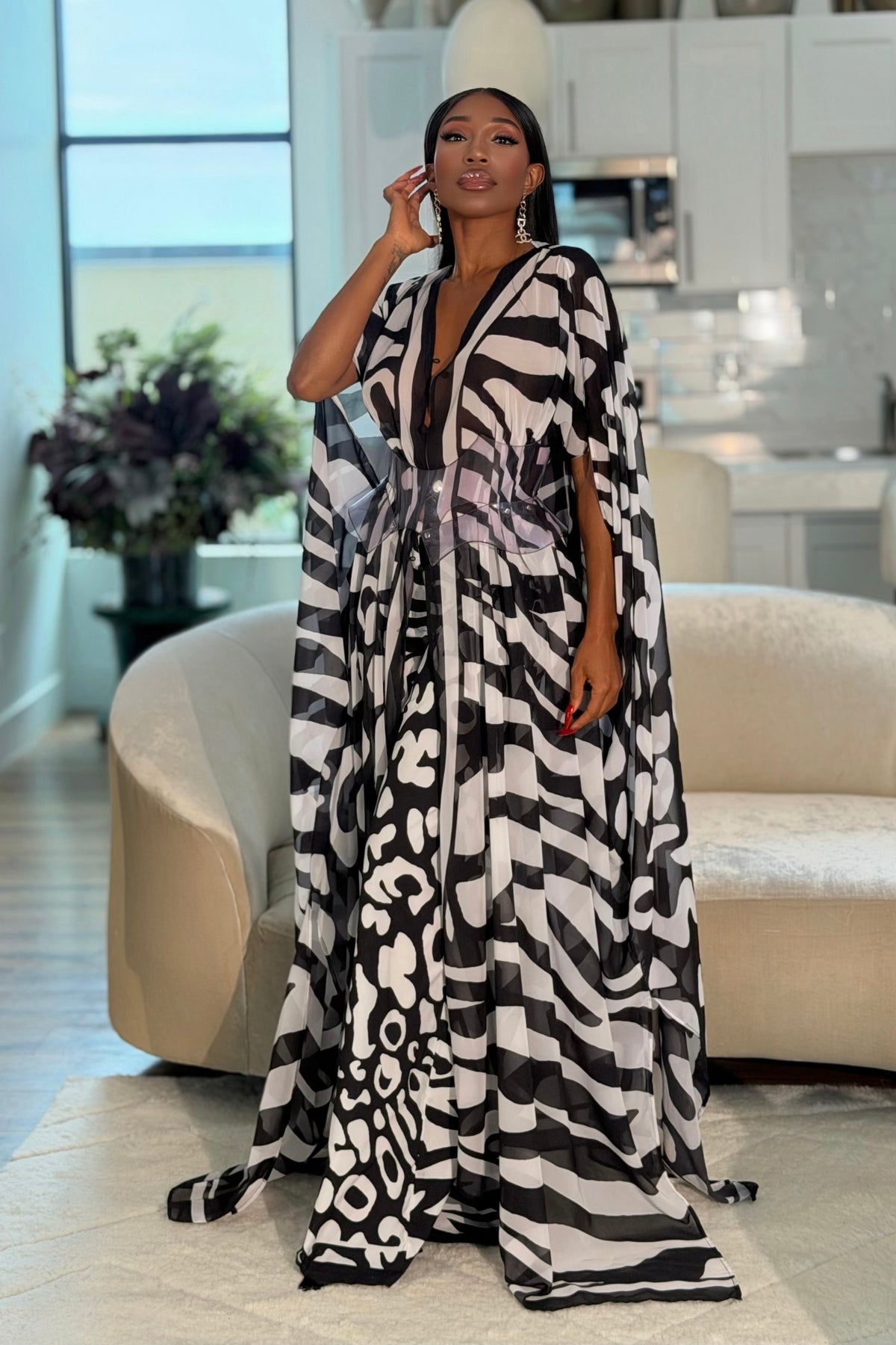 Karmyn Pants by Sai Sankoh in black and white print, worn under the matching kaftan draped closed, full-length front view