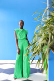 The celeste jumpsuit drapes elegantly down the body in a green-toned zebra print.