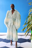 The Enola Shaggy Coat has an ombre effect from light blue to creamy white. Feel secure with the shaggy belt included in your purchase.