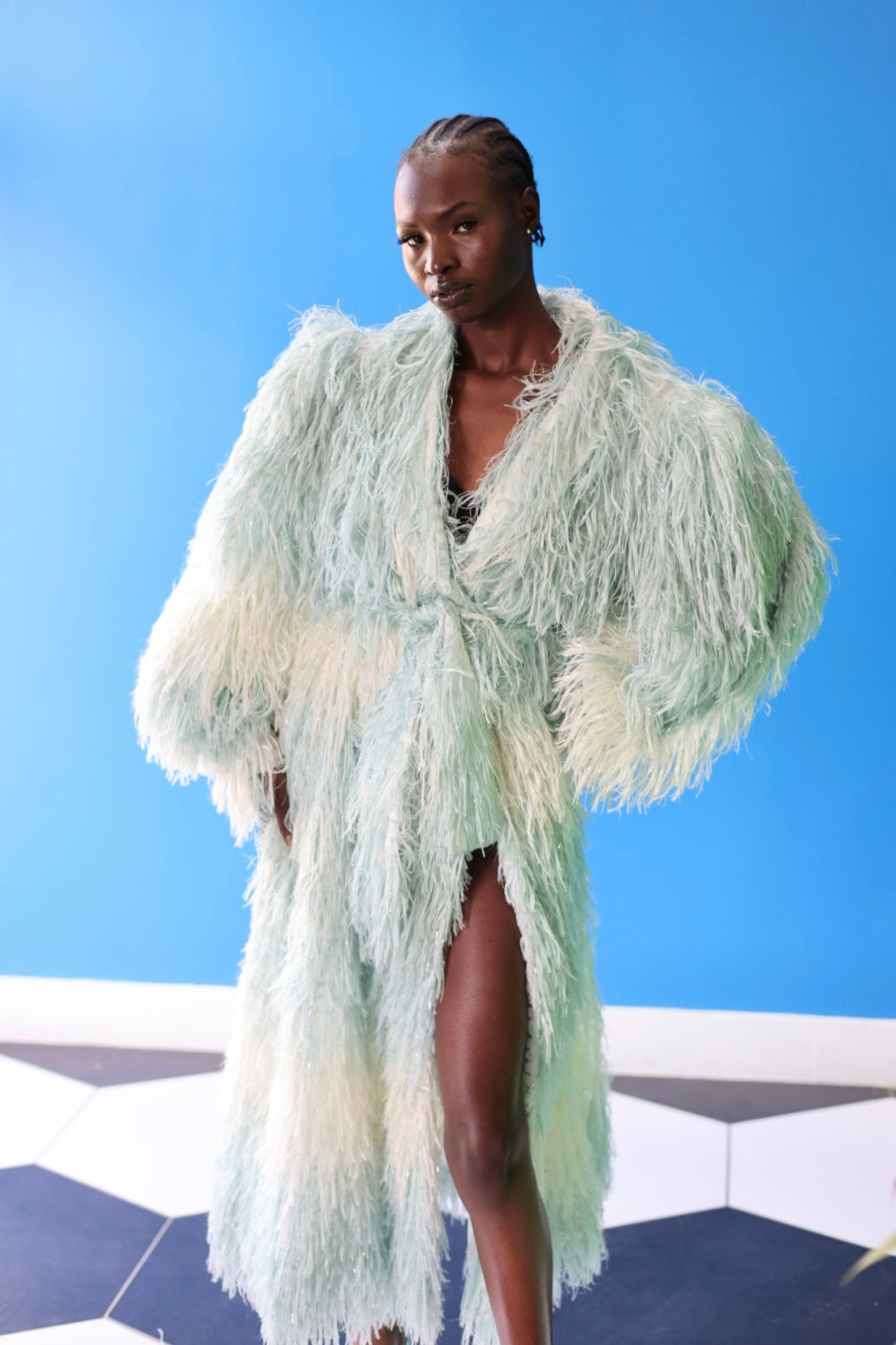 The Enola Shaggy Coat has an ombre effect from light blue to creamy white and is suitable for a wide range of body types, giving everyone a gorgeous silhouette.