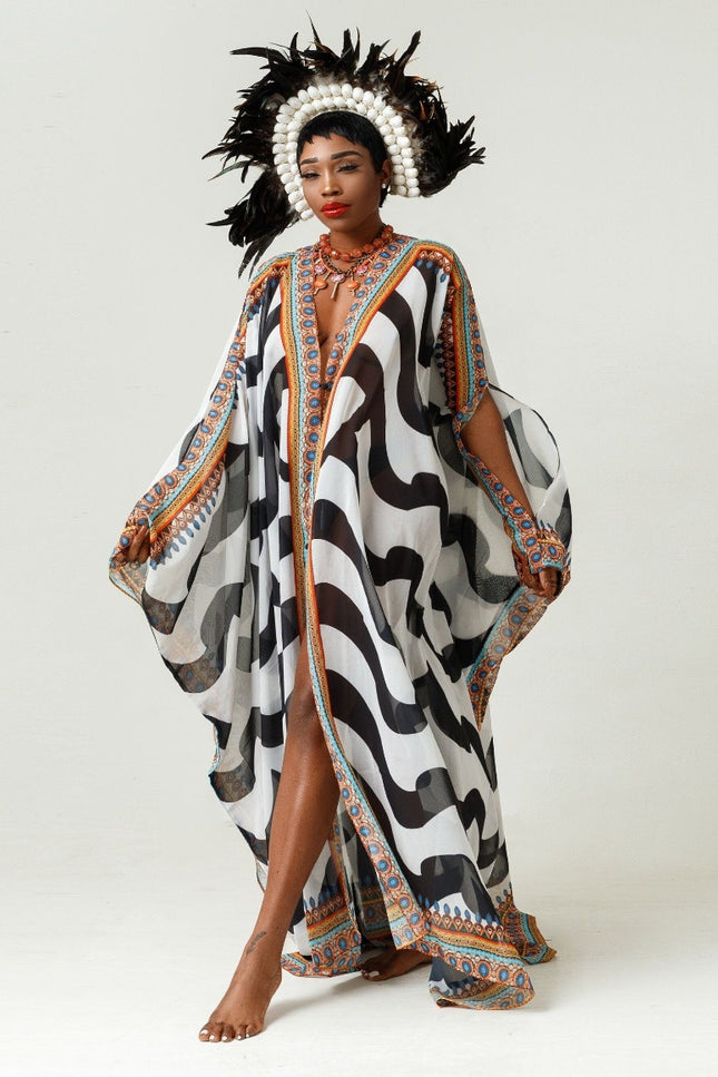 Tanzania Goddess Kaftan by Sai Sankoh, warm earth-tone print luxury resort kaftan